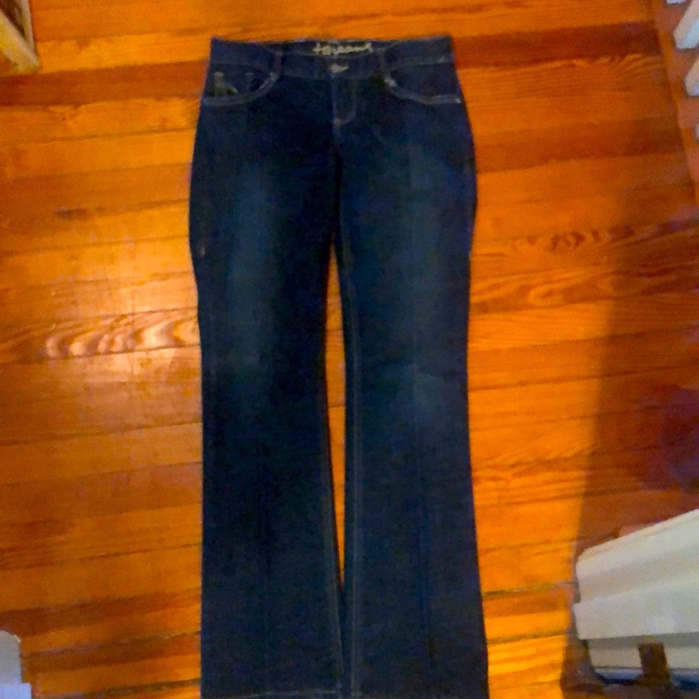 Mid rise Tag brand boot leg jeans